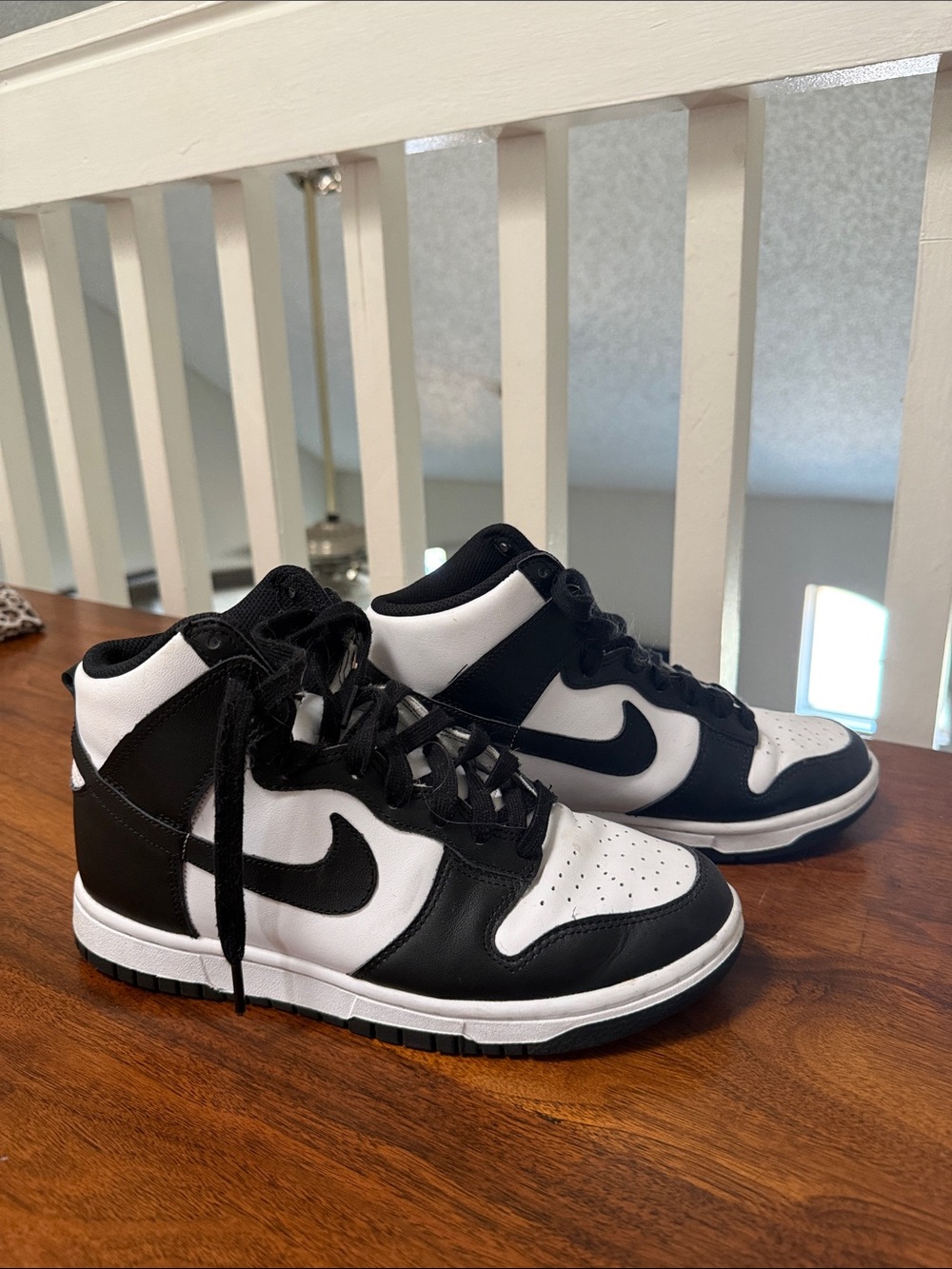 Nike woman’s  Black and White High-Top Sneakers